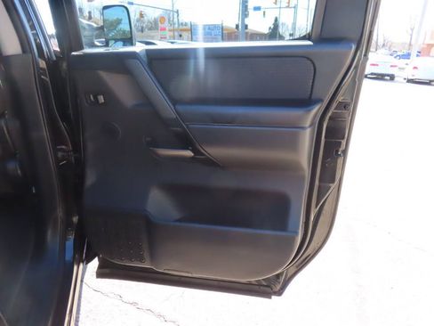 Used 2012 Nissan Titan SV w/ SV Premium Utility Pkg AWD/4WD image 12