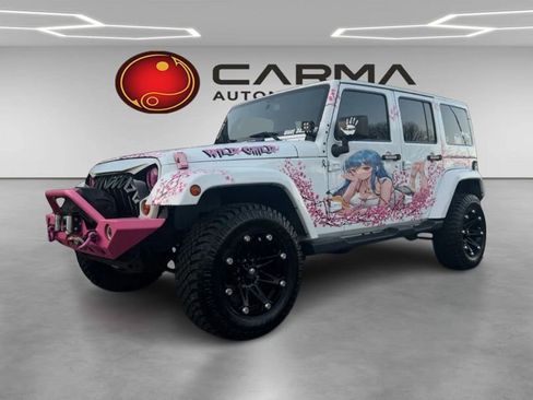 Used 2013 Jeep Wrangler Unlimited Sahara w/ Connectivity Group image 1