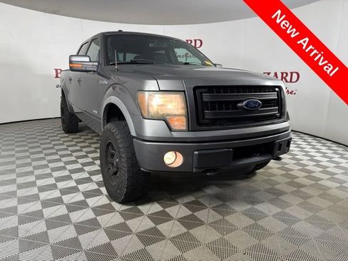 Used 2013 Ford F150 FX4 w/ Mid Equipment Group AWD/4WD image 1