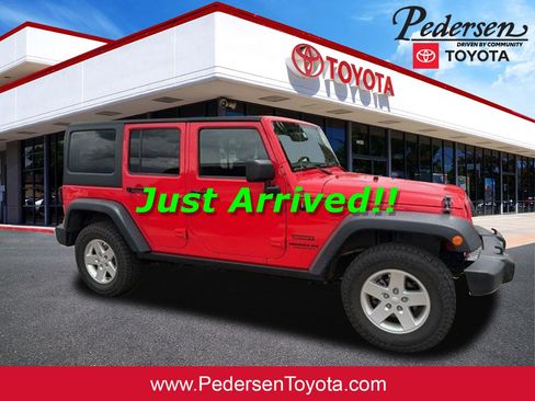 Used 2013 Jeep Wrangler Unlimited Sport AWD/4WD image 1