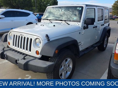 Used 2010 Jeep Wrangler Unlimited Sport image 1