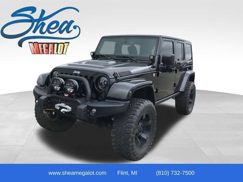 Used 2014 Jeep Wrangler Unlimited Rubicon w/ Connectivity Group AWD/4WD image 1