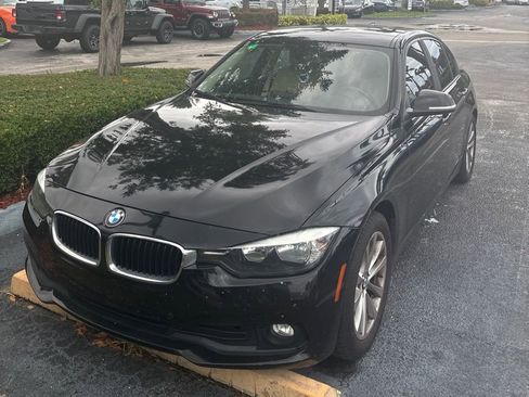 Used 2017 BMW 320i Sedan RWD image 1