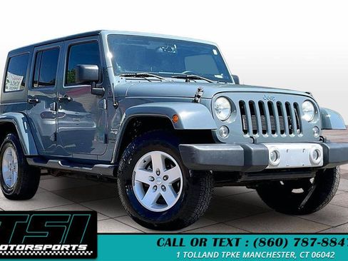 Used 2014 Jeep Wrangler Unlimited Sahara w/ Dual Top Group AWD/4WD image 10