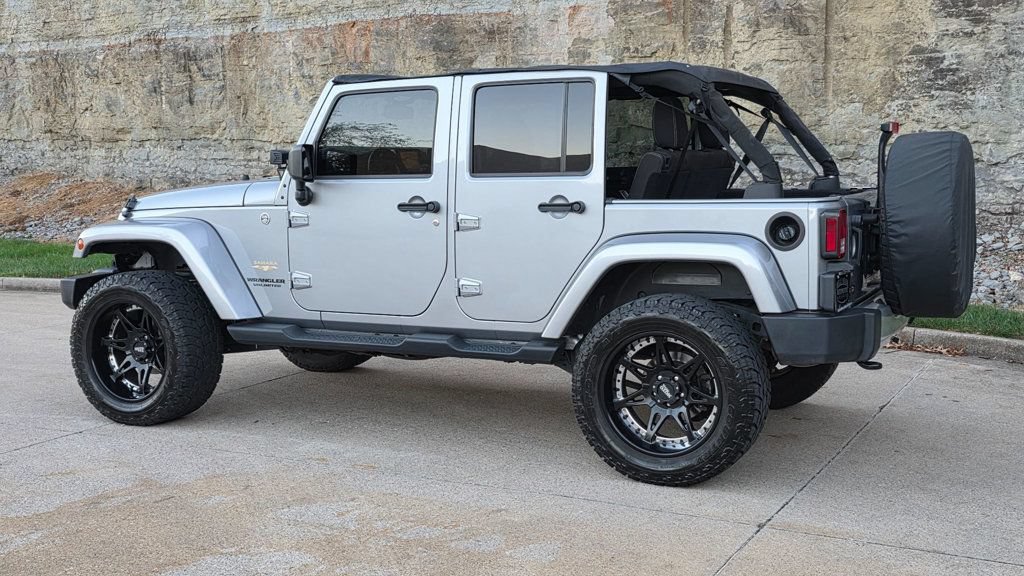Used 2014 Jeep Wrangler Unlimited Sahara AWD/4WD image 9
