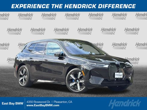 Used 2024 BMW iX xDrive50 w/ Premium Package AWD/4WD image 1