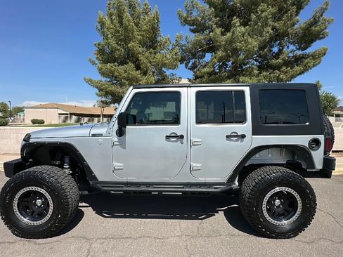 Used 2010 Jeep Wrangler Unlimited Sport AWD/4WD image 1