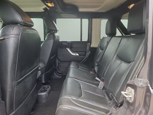 Used 2016 Jeep Wrangler Unlimited Sahara w/ Dual Top Group AWD/4WD image 11