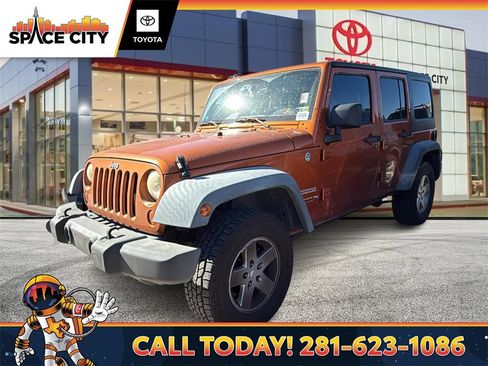 Used 2011 Jeep Wrangler Unlimited Sport image 1