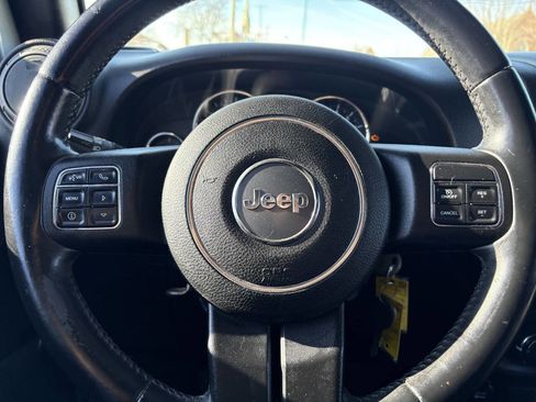 Used 2015 Jeep Wrangler Unlimited Sport w/ Mopar Black Appearance Group image 34