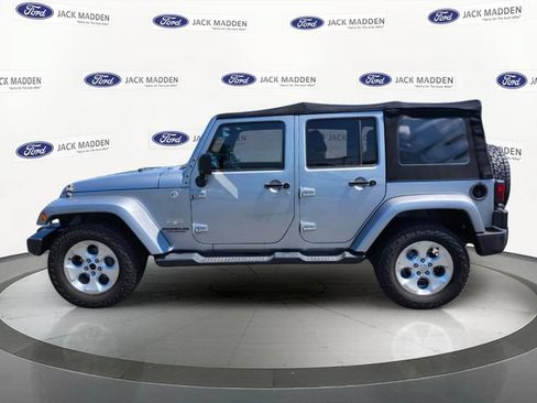 Used 2013 Jeep Wrangler Unlimited Sahara AWD/4WD image 2