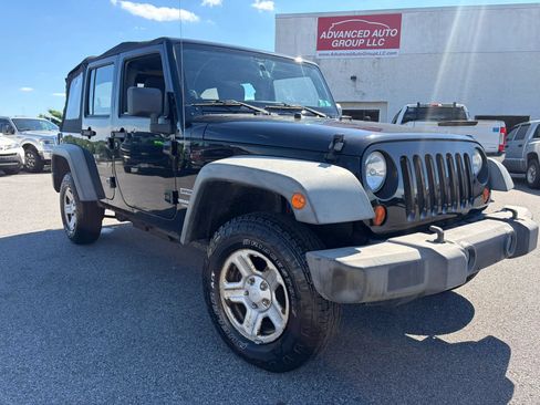 Used 2011 Jeep Wrangler Unlimited Sport AWD/4WD image 14