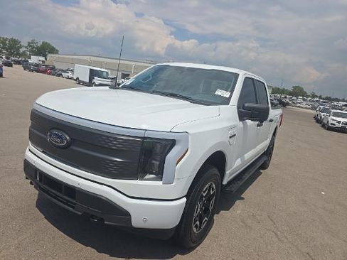 Used 2023 Ford F150 Lightning XLT AWD/4WD image 1