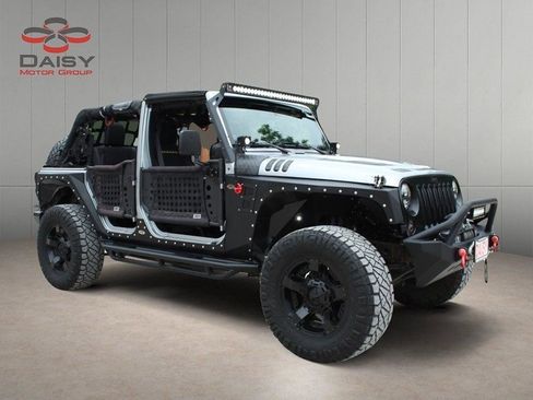 Used 2013 Jeep Wrangler Unlimited Sahara w/ Connectivity Group AWD/4WD image 13