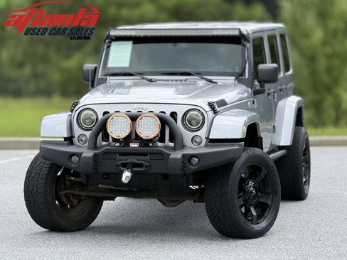 Used 2014 Jeep Wrangler Unlimited Rubicon w/ Dual Top Group AWD/4WD image 1