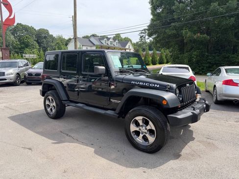 Used 2012 Jeep Wrangler Unlimited Rubicon w/ Dual Top Group AWD/4WD image 3