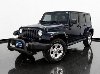Used 2013 Jeep Wrangler Unlimited Sahara w/ Dual Top Group AWD/4WD video 1