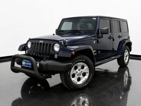 Used 2013 Jeep Wrangler Unlimited Sahara w/ Dual Top Group AWD/4WD image 1