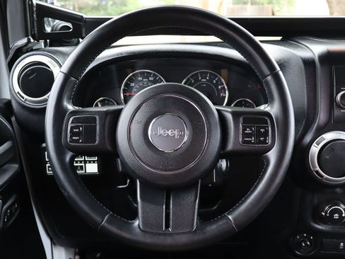 Used 2013 Jeep Wrangler Unlimited Sahara AWD/4WD image 18