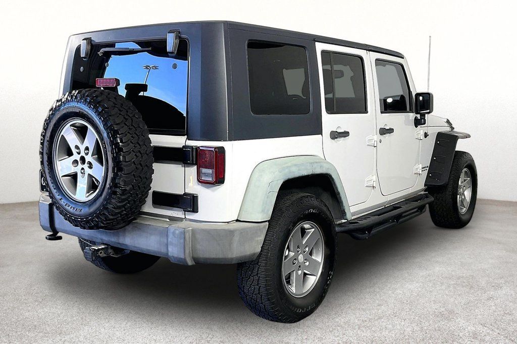 Used 2013 Jeep Wrangler Unlimited Sport AWD/4WD image 2