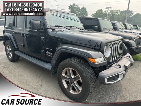 Used 2019 Jeep Wrangler Unlimited Sahara w/ Dual Top Group AWD/4WD image 1