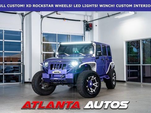 Used 2018 Jeep Wrangler Unlimited Sahara image 1