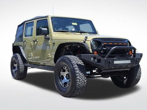 Used 2013 Jeep Wrangler Unlimited Sport w/ Max Tow Pkg AWD/4WD image 1