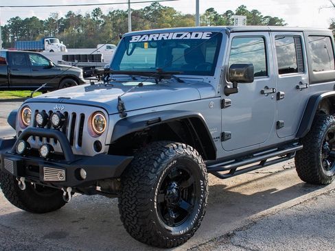 Used 2014 Jeep Wrangler Unlimited Sahara w/ Max Tow Package image 2