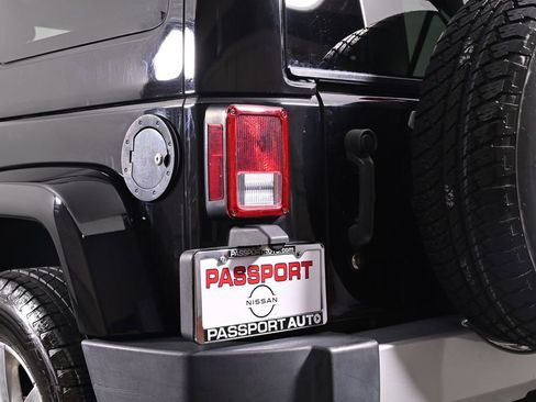 Used 2015 Jeep Wrangler Unlimited Sahara w/ Dual Top Group AWD/4WD image 10