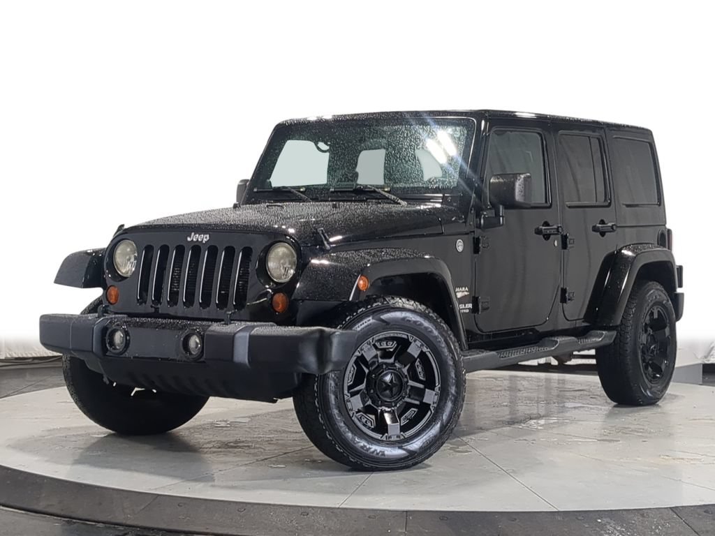 Used 2012 Jeep Wrangler Unlimited Sahara AWD/4WD image 1