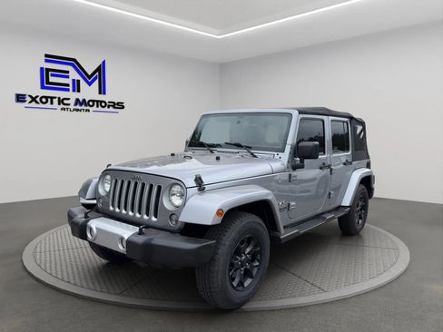 Used 2016 Jeep Wrangler Unlimited Sahara w/ Max Tow Package AWD/4WD image 1