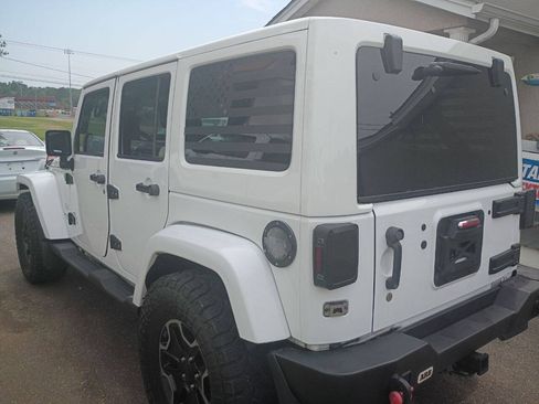 Used 2014 Jeep Wrangler Unlimited Sahara w/ Max Tow Package AWD/4WD image 9