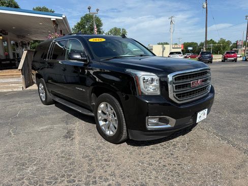 Used 2016 GMC Yukon XL SLT w/ Open Road Package AWD/4WD image 1