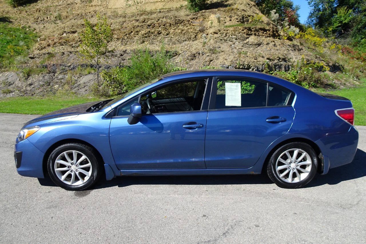 Used 2014 Subaru Impreza 2.0i Premium w/ All-Weather Package w/CVT AWD/4WD image 1