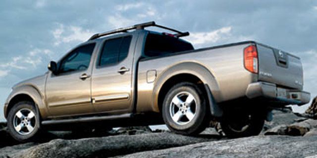 Used 2007 Nissan Frontier LE AWD/4WD image 1