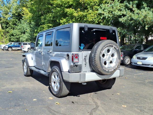 Used 2013 Jeep Wrangler Unlimited Sahara w/ Dual Top Group AWD/4WD image 5