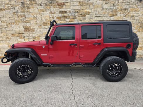 Used 2012 Jeep Wrangler Unlimited Sport AWD/4WD image 1