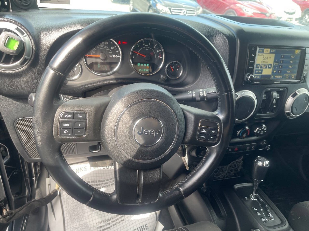Used 2012 Jeep Wrangler Unlimited Sahara w/ Dual Top Group AWD/4WD image 13