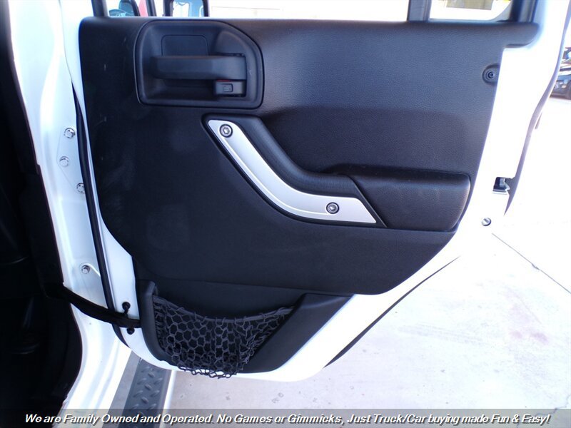 Used 2012 Jeep Wrangler Unlimited Sahara w/ Dual Top Group AWD/4WD image 23