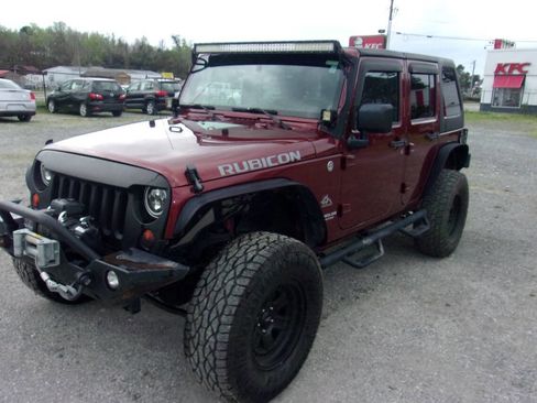 Used 2010 Jeep Wrangler Unlimited Rubicon w/ Dual Top Group image 3
