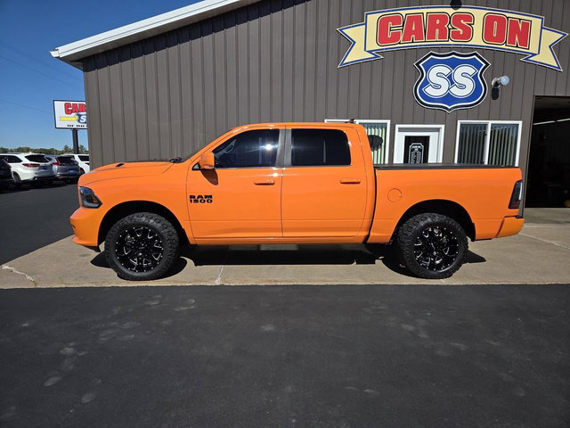 Used 2015 RAM 1500 Sport w/ Ignition Orange Sport Package AWD/4WD image 1