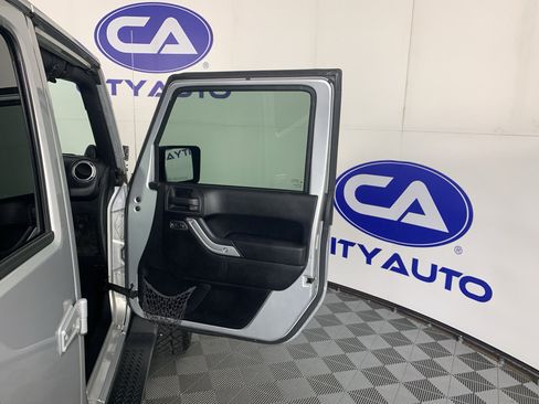 Used 2012 Jeep Wrangler Unlimited Sahara w/ Trailer Tow Group AWD/4WD image 38