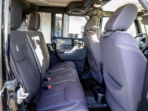 Used 2013 Jeep Wrangler Unlimited Sahara w/ Max Tow Pkg image 16