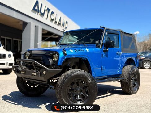 Used 2016 Jeep Wrangler Sport image 1