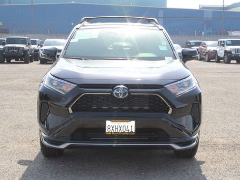 Used 2021 Toyota RAV4 SE w/ Weather & Moonroof Package AWD/4WD image 2