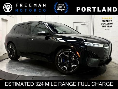 Used 2024 BMW iX xDrive50 w/ Sport Package AWD/4WD image 1