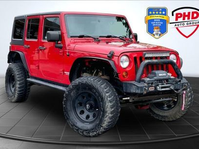 Used 2012 Jeep Wrangler Unlimited Rubicon w/ Dual Top Group