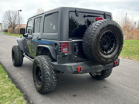 Used 2014 Jeep Wrangler Unlimited Sahara w/ Connectivity Group AWD/4WD image 7