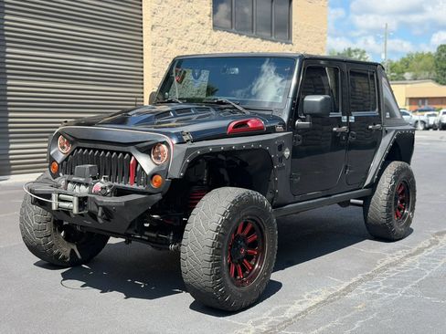 Used 2013 Jeep Wrangler Unlimited Sahara w/ Mopar Chrome Edition Group AWD/4WD image 2