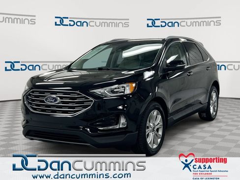 Used 2020 Ford Edge Titanium w/ Cargo Accessory Package FWD image 1